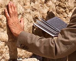 Praying against the wall